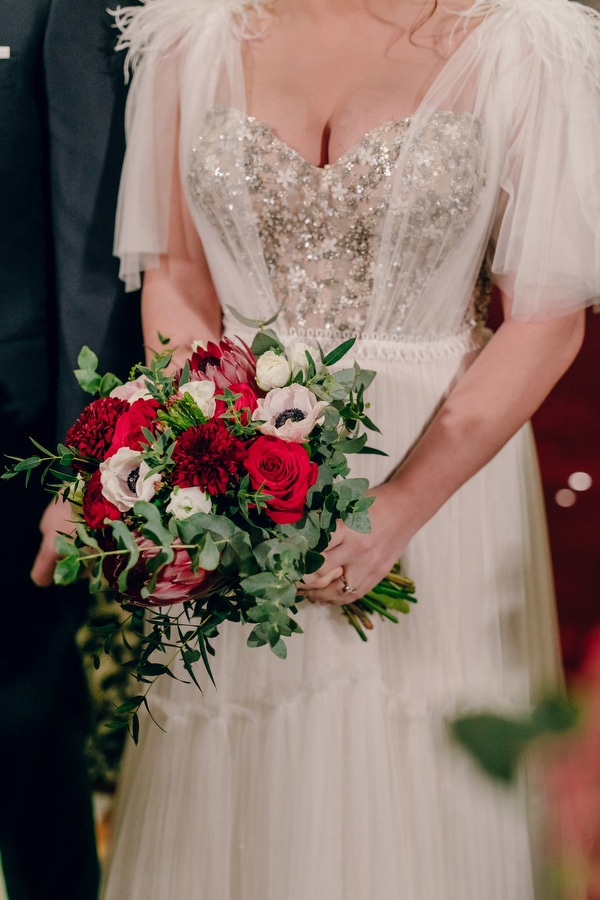 festive-winter-wedding-fairylights-red-hues_09x