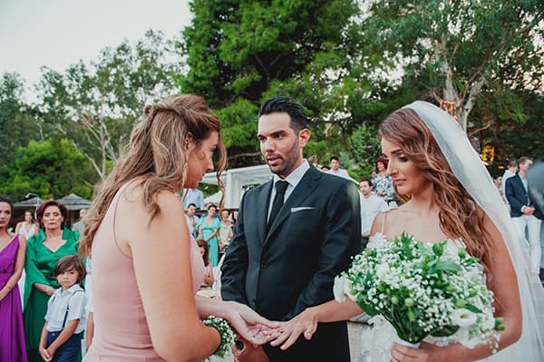 romantic-summer-wedding-lake-iraiou-lycianthus-baby-breath_22