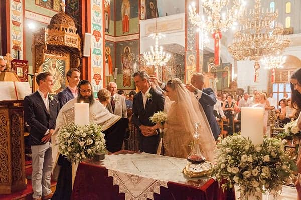 elegant-summer-wedding-palairos-white-roses-lycianthus-olive-leaves_13