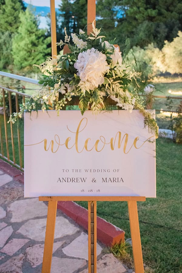 elegant-summer-wedding-palairos-white-roses-lycianthus-olive-leaves_18