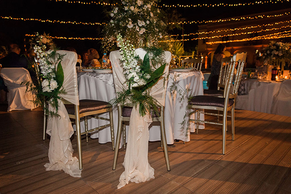 elegant-summer-wedding-palairos-white-roses-lycianthus-olive-leaves_30