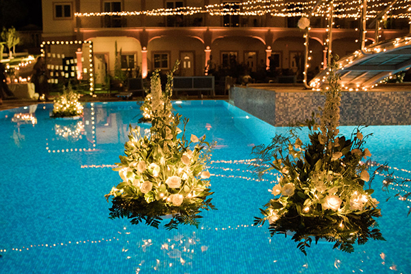 elegant-summer-wedding-palairos-white-roses-lycianthus-olive-leaves_32