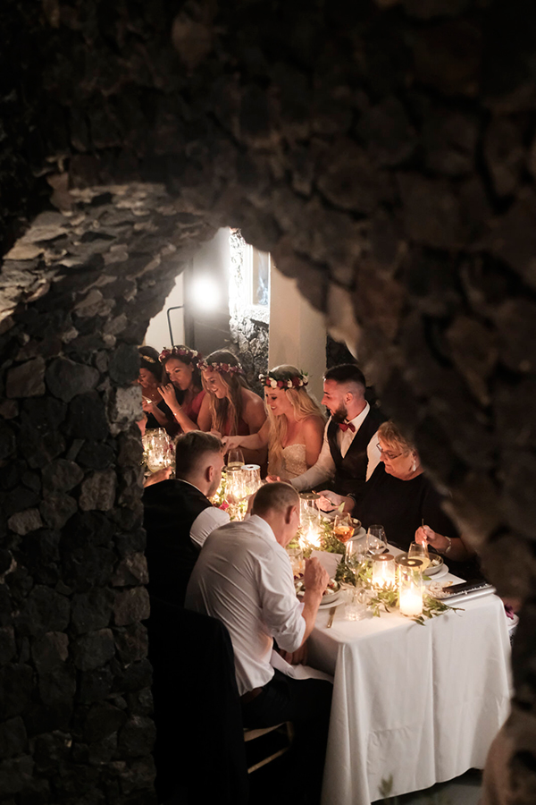 intimate-wedding-santorini-island-burgundy-hues-bright-letters_43