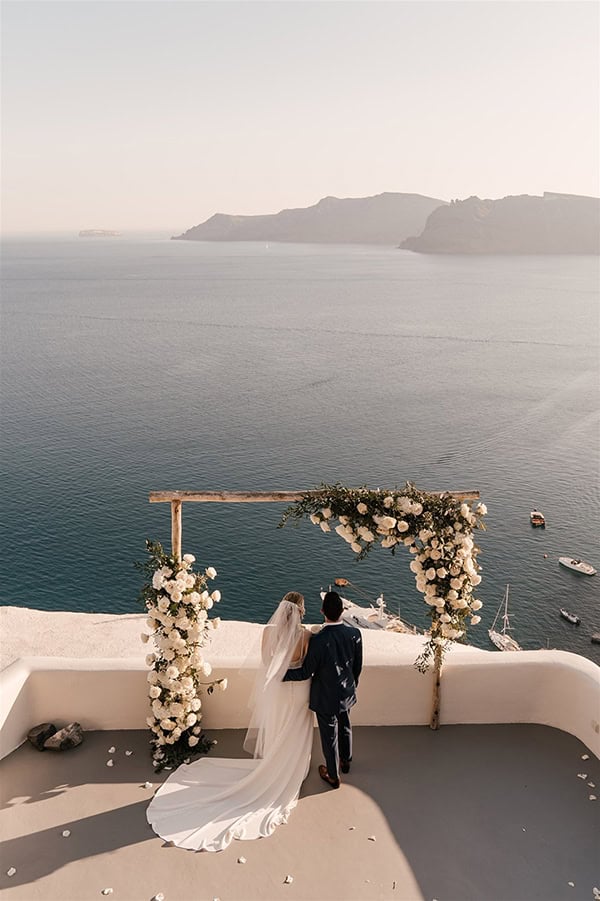 utterly-romantic-destination-wedding-santorini-white-roses-elegant-details_21