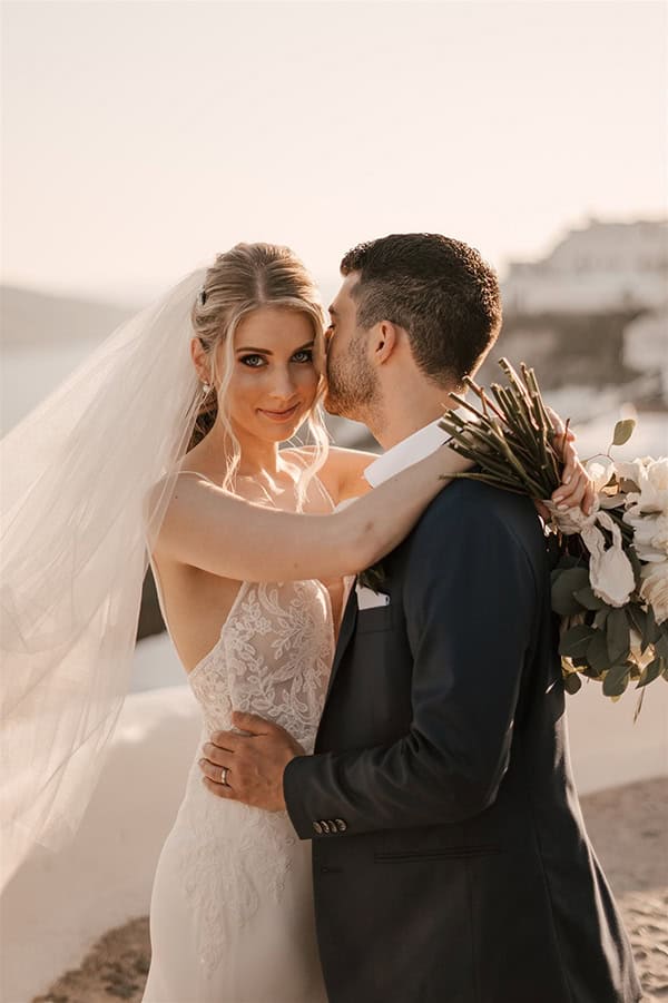 utterly-romantic-destination-wedding-santorini-white-roses-elegant-details_25