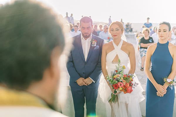 stylish-summer-wedding-nava-seaside-colorful-florals_34