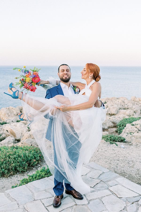 stylish-summer-wedding-nava-seaside-colorful-florals_40