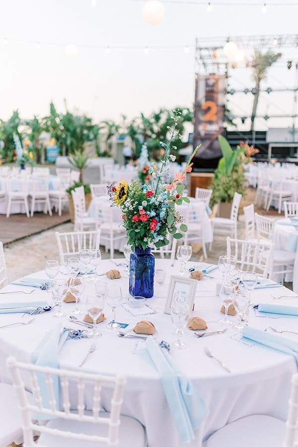 stylish-summer-wedding-nava-seaside-colorful-florals_41