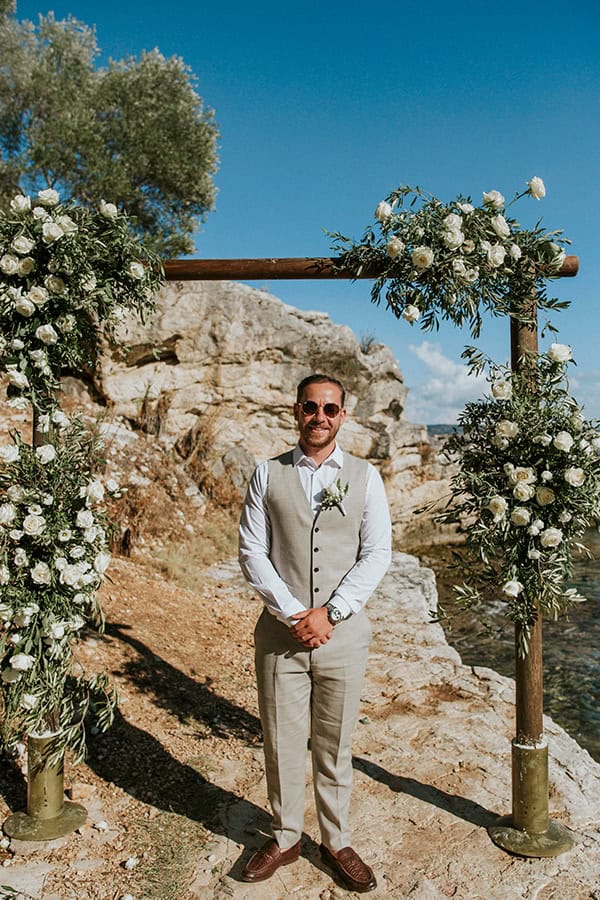 outdoor-summer-wedding-corfu-white-blooms-lush-olive-leaves_20