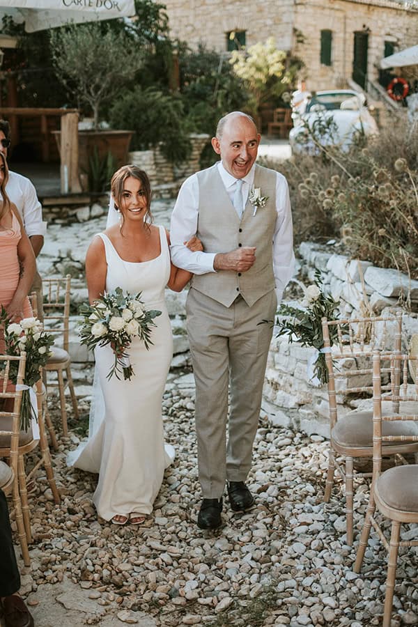 outdoor-summer-wedding-corfu-white-blooms-lush-olive-leaves_23