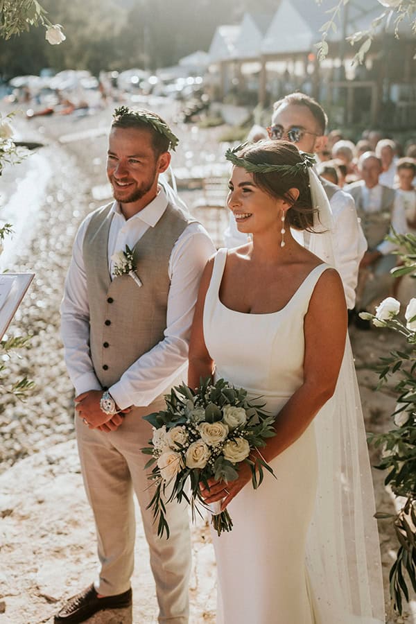 outdoor-summer-wedding-corfu-white-blooms-lush-olive-leaves_25