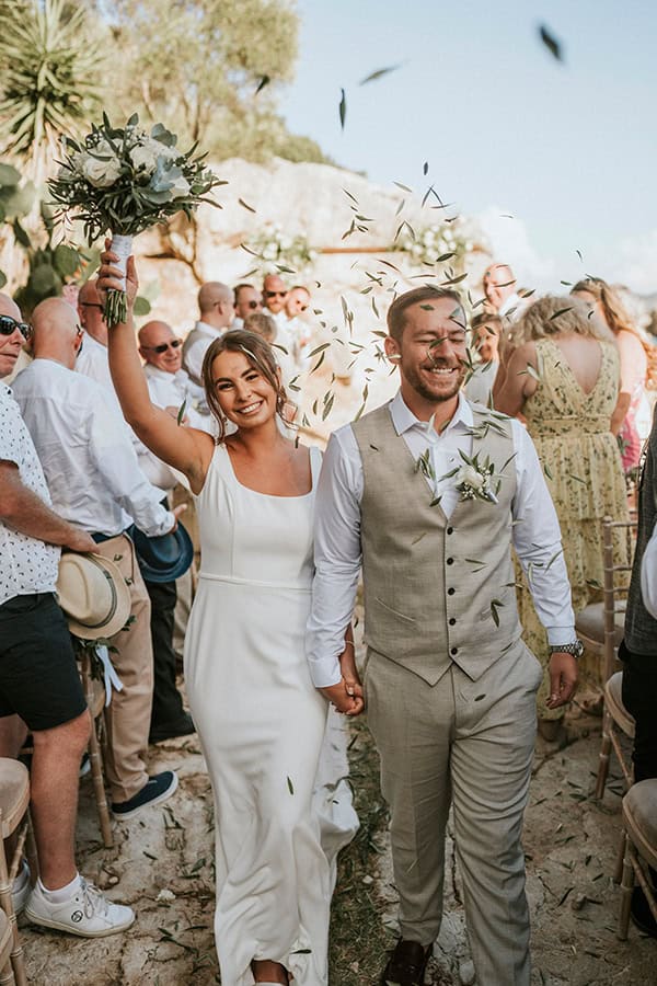 outdoor-summer-wedding-corfu-white-blooms-lush-olive-leaves_28