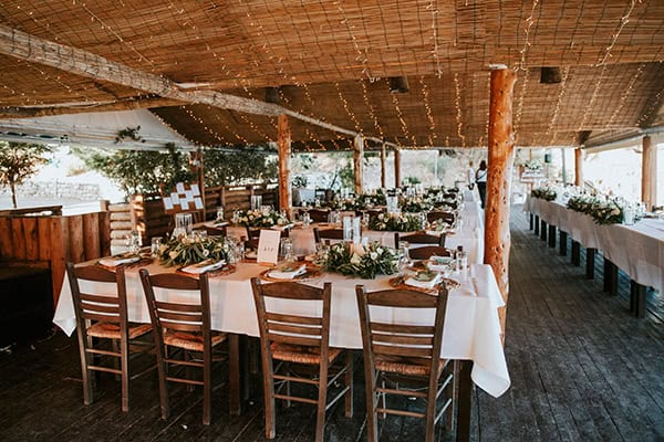 outdoor-summer-wedding-corfu-white-blooms-lush-olive-leaves_31