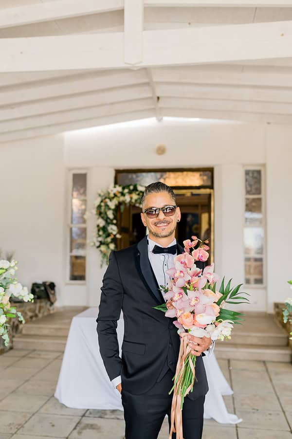 summer-wedding-nicosia-beautiful-florals-orchids-roses-white-coral-hues_23x