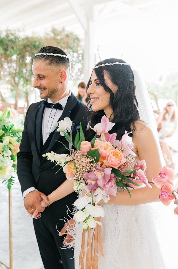 summer-wedding-nicosia-beautiful-florals-orchids-roses-white-coral-hues_34
