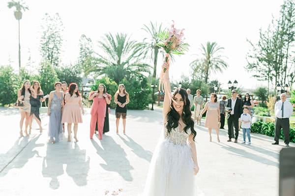 summer-wedding-nicosia-beautiful-florals-orchids-roses-white-coral-hues_39