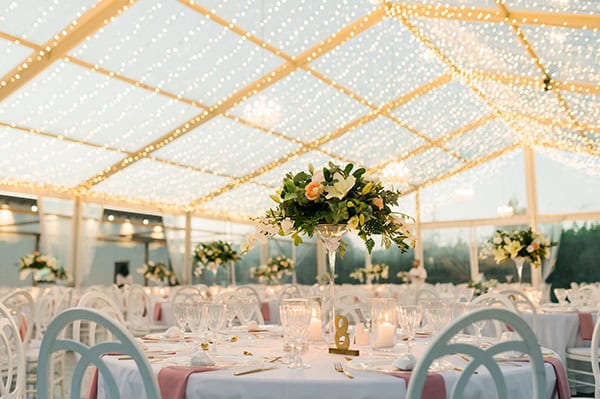 summer-wedding-nicosia-beautiful-florals-orchids-roses-white-coral-hues_47