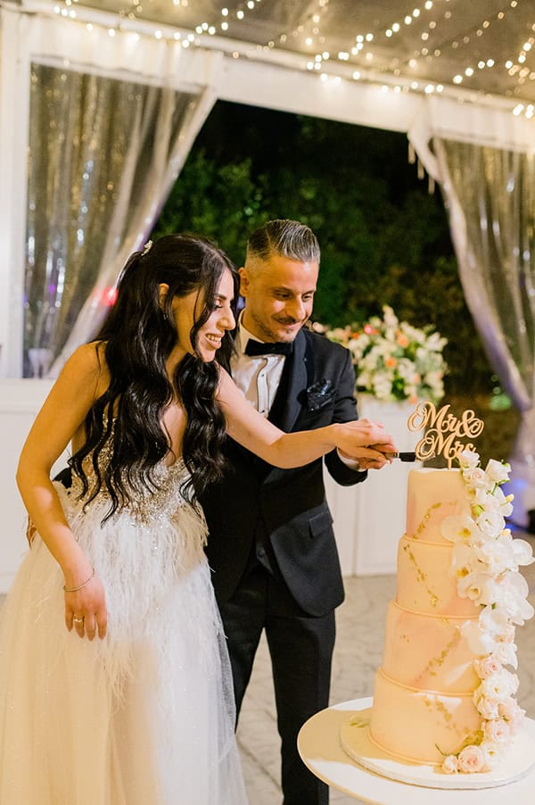 summer-wedding-nicosia-beautiful-florals-orchids-roses-white-coral-hues_54