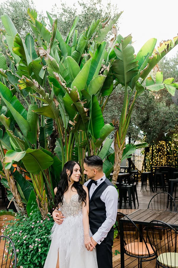 summer-wedding-nicosia-beautiful-florals-orchids-roses-white-coral-hues_70