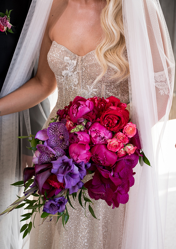 modern-summer-wedding-larnaca-purple-fuchsia-flowers_13x