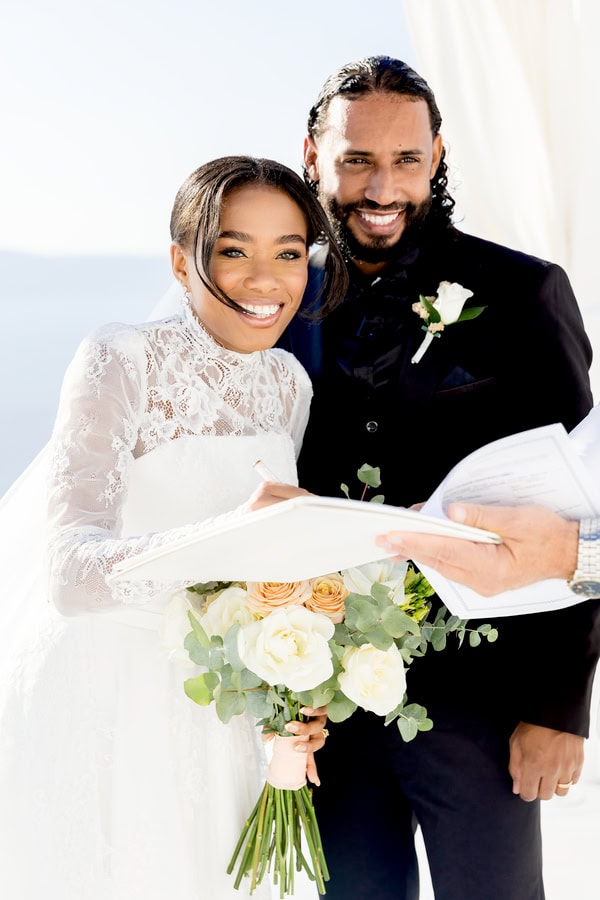 Elopement In Santorini With Aegean Blue Backdrop