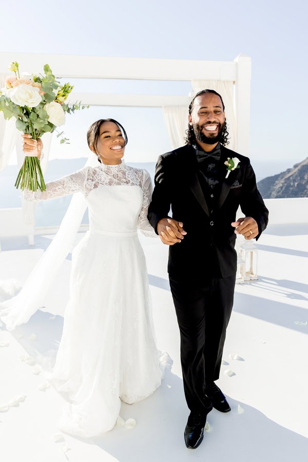 Elopement In Santorini With Aegean Blue Backdrop