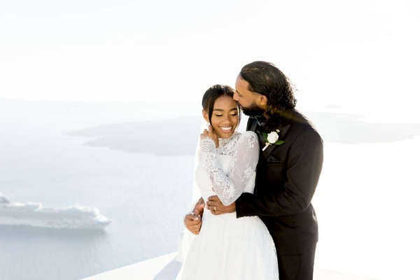 Elopement In Santorini With Aegean Blue Backdrop