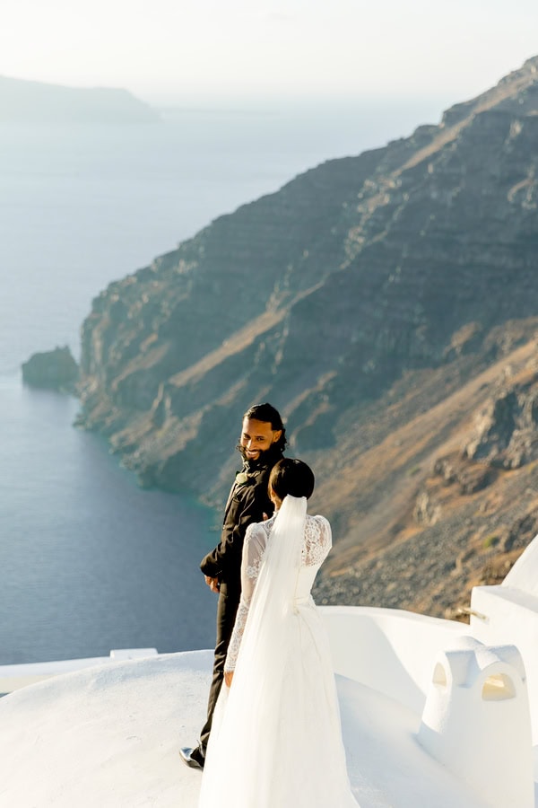 Elopement In Santorini With Aegean Blue Backdrop
