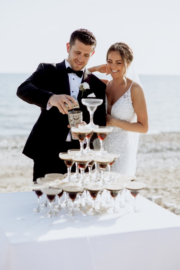 Classic Timeless Wedding By The Sea With White Blooms