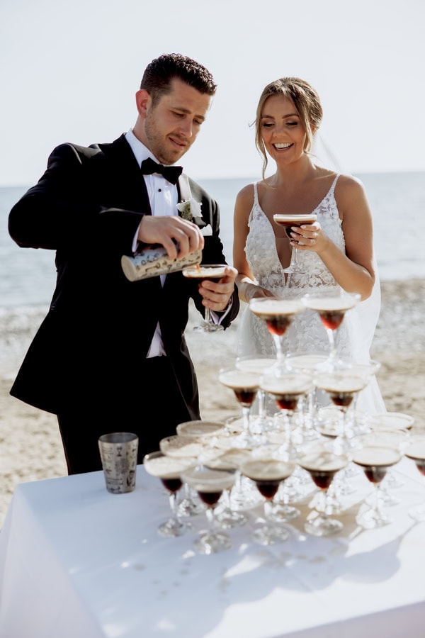 Classic Timeless Wedding By The Sea With White Blooms
