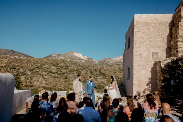 Summer Wedding In Naxos With White Flowers And Olive Leaves