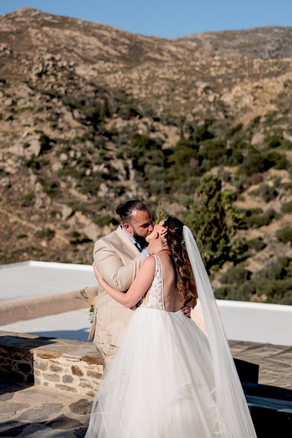 Summer Wedding In Naxos With White Flowers And Olive Leaves
