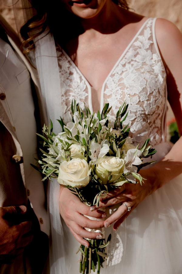 Summer Wedding In Naxos With White Flowers And Olive Leaves