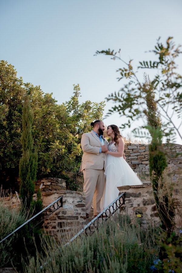 Summer Wedding In Naxos With White Flowers And Olive Leaves