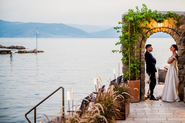 Summer Wedding With White Floral Arrangements In Nafplio
