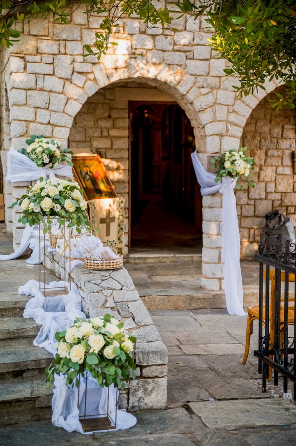 Summer Wedding With White Floral Arrangements In Nafplio