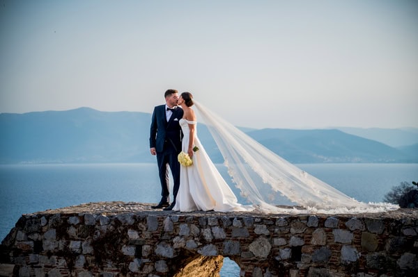 Summer Wedding With White Floral Arrangements In Nafplio