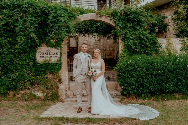 Destination Wedding At Vasilias Nikoklis Inn With Roses And Lisianthus