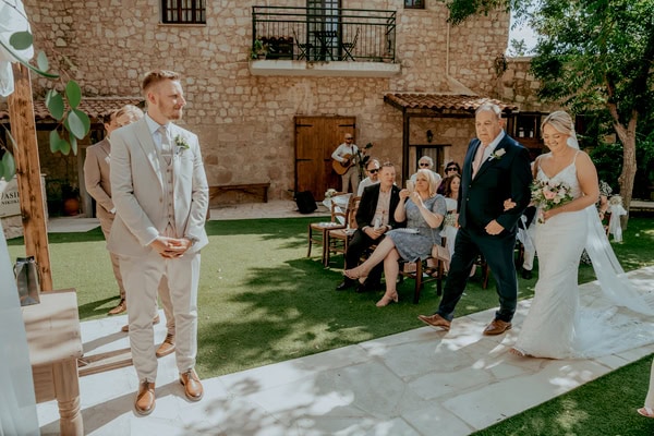 Destination Wedding At Vasilias Nikoklis Inn With Roses And Lisianthus