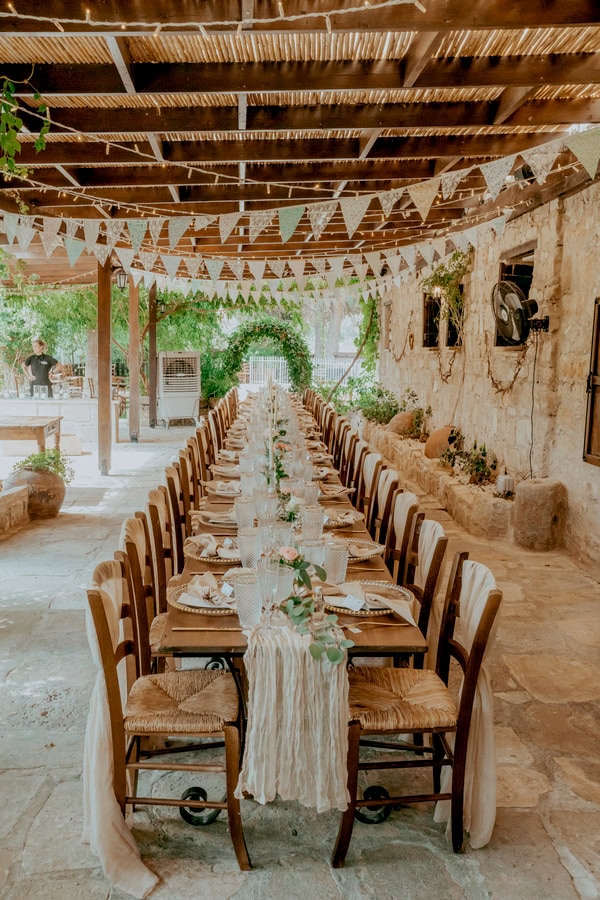 Destination Wedding At Vasilias Nikoklis Inn With Roses And Lisianthus